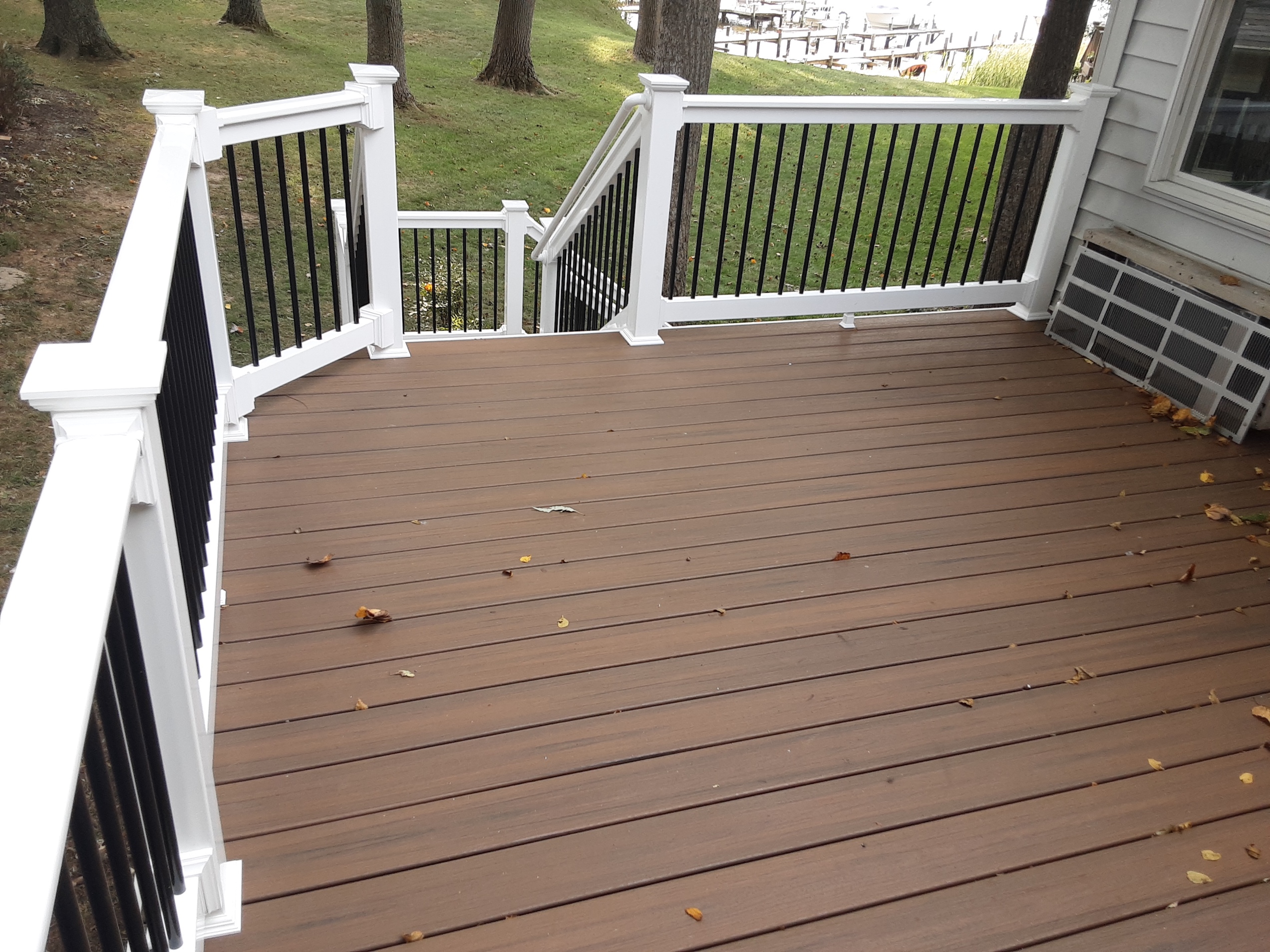 Composite deck clearance resurfacing