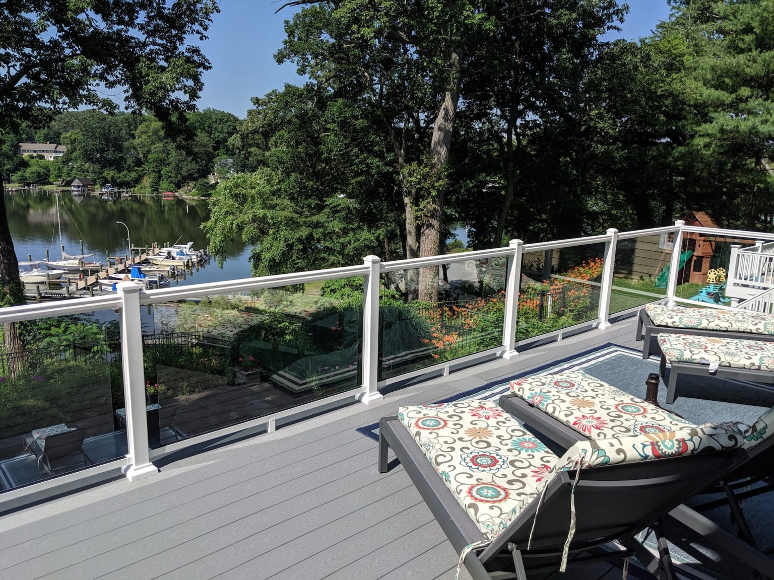 Trex Select Pebble Gray Decking With White Ultralox Aluminum Railing With Full Glass Panel Infills In Severna Park MD 1536x1152 