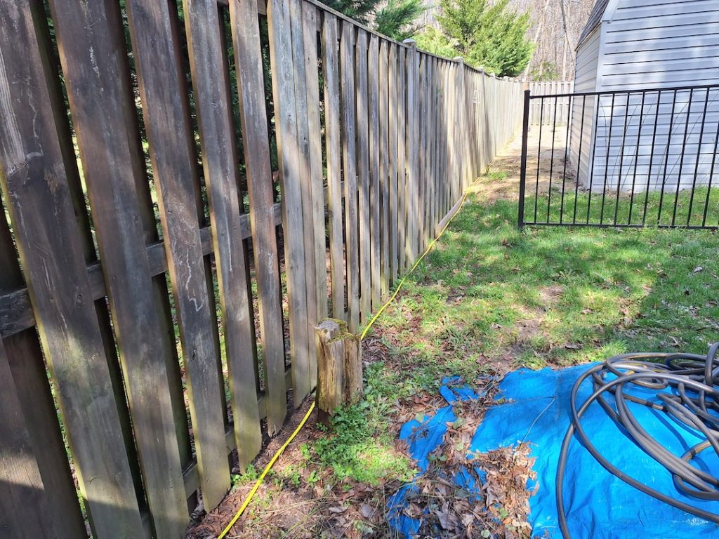 wooden fence before makeover