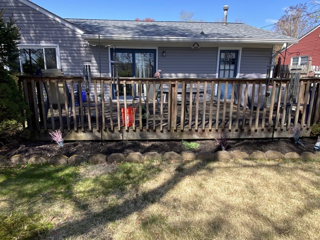 wood deck railing in need of replacement