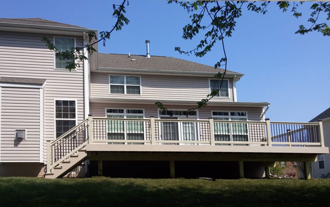 29-Composite deck with tan vinyl railing and tan facia wrap