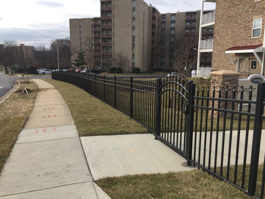 Aluminum Fence at Buzzuto Oakcrest Conifer