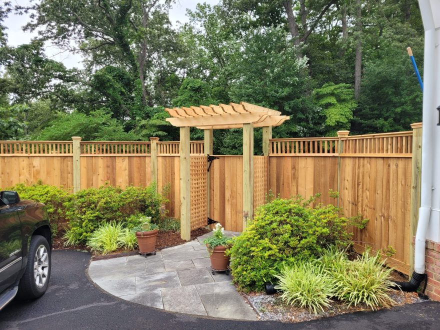 Cedar Vertical Board Fence w 6x6 Pressure-Treated Posts, Cedar Closed Spindles, Bottom 1x6 Cedar Fascia Boards, Cedar New England Post Caps, gate and trellis