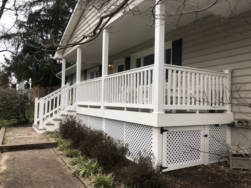 Front Porch with Lattice Wrap and Storage door in Lattice