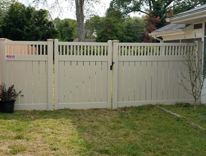 Tan Vinyl Semi-Private Fence with Closed Spindle Topper