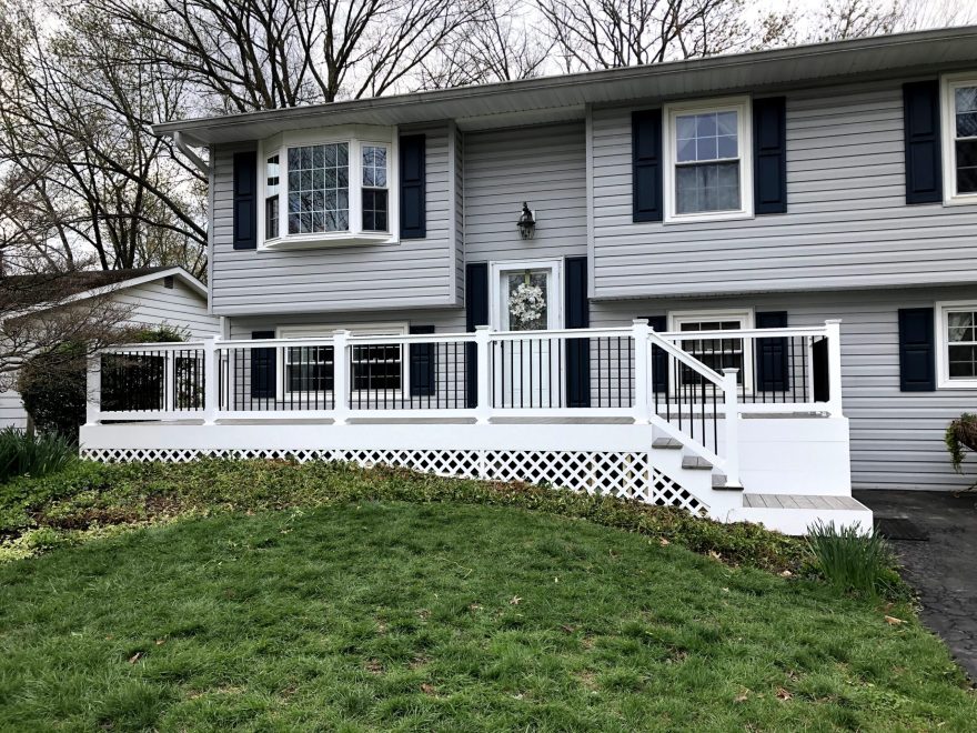 TimberTech Reserve Driftwood Decking with White Washington Railing with Black Aluminum Balusters - Front Porch