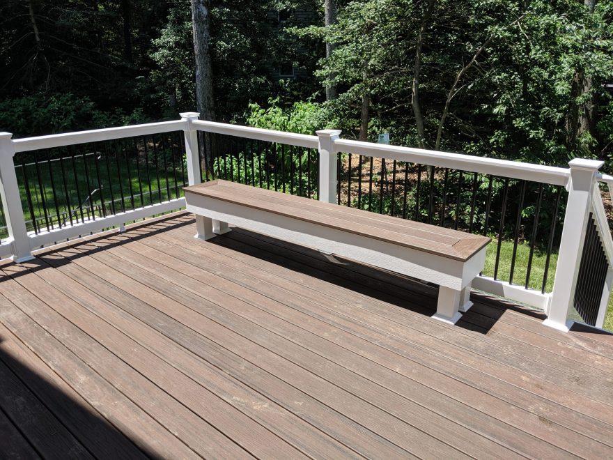 Trex Transcend Spiced Rum Decking with White Washington Vinyl with Black Round Aluminum Balusters