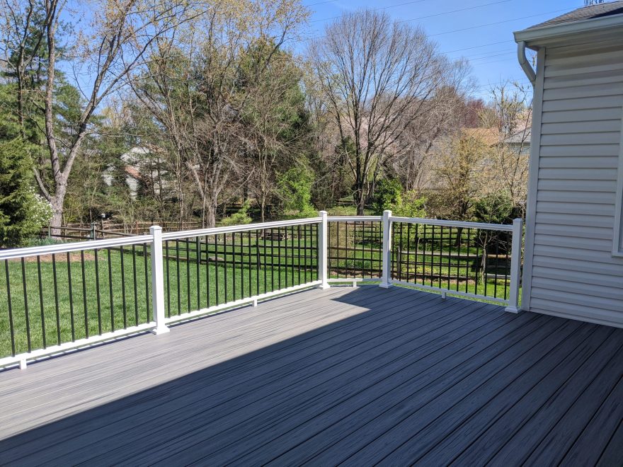 Trex Transcends Island Mist Decking with a mixed color black and white Ultralox Aluminum Railing in Ellicott City MD