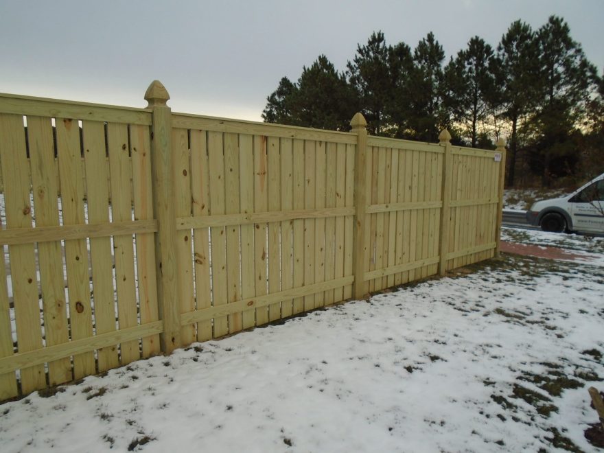 Vertical Board Spaced Picket Wood Fence with French Gothic Posts 3