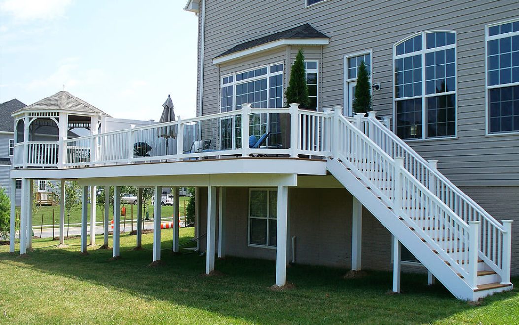 White Washington vinyl railing with glass pickets and vinyl gazebo white beam and support post wraps