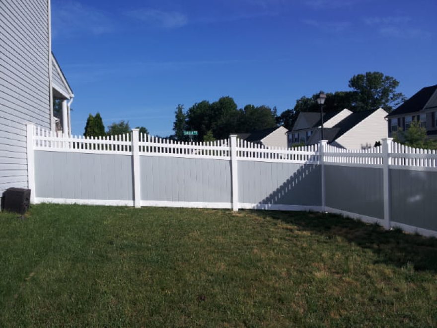 White and Gray T&G Vinyl Fence with Scalloped Open Spindle Topper