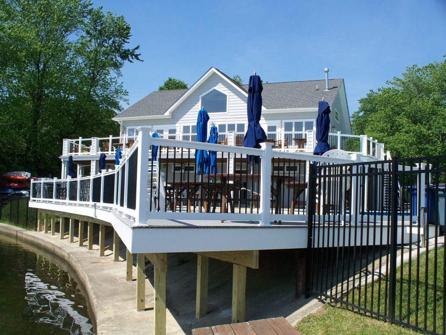 waterfront community composite porch & deck + Perimeter Aluminum fencing